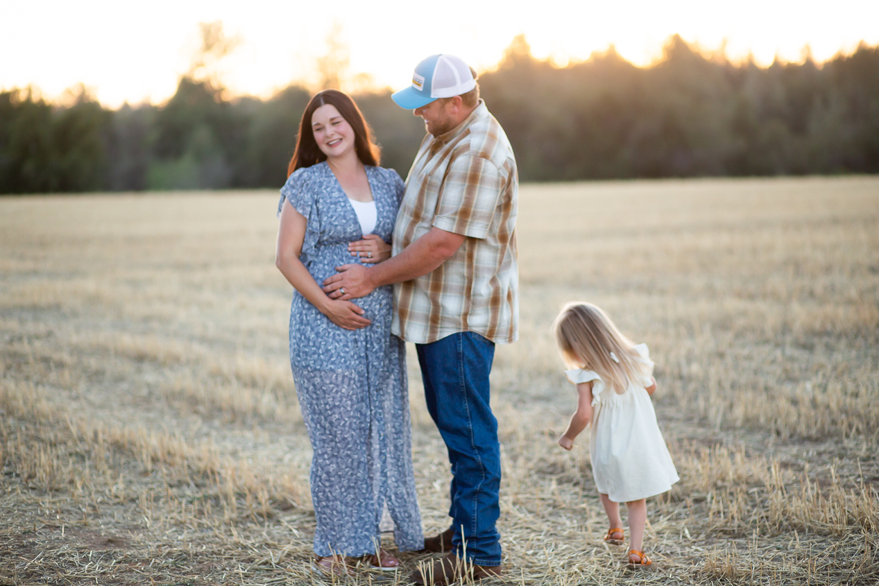family in big open field 