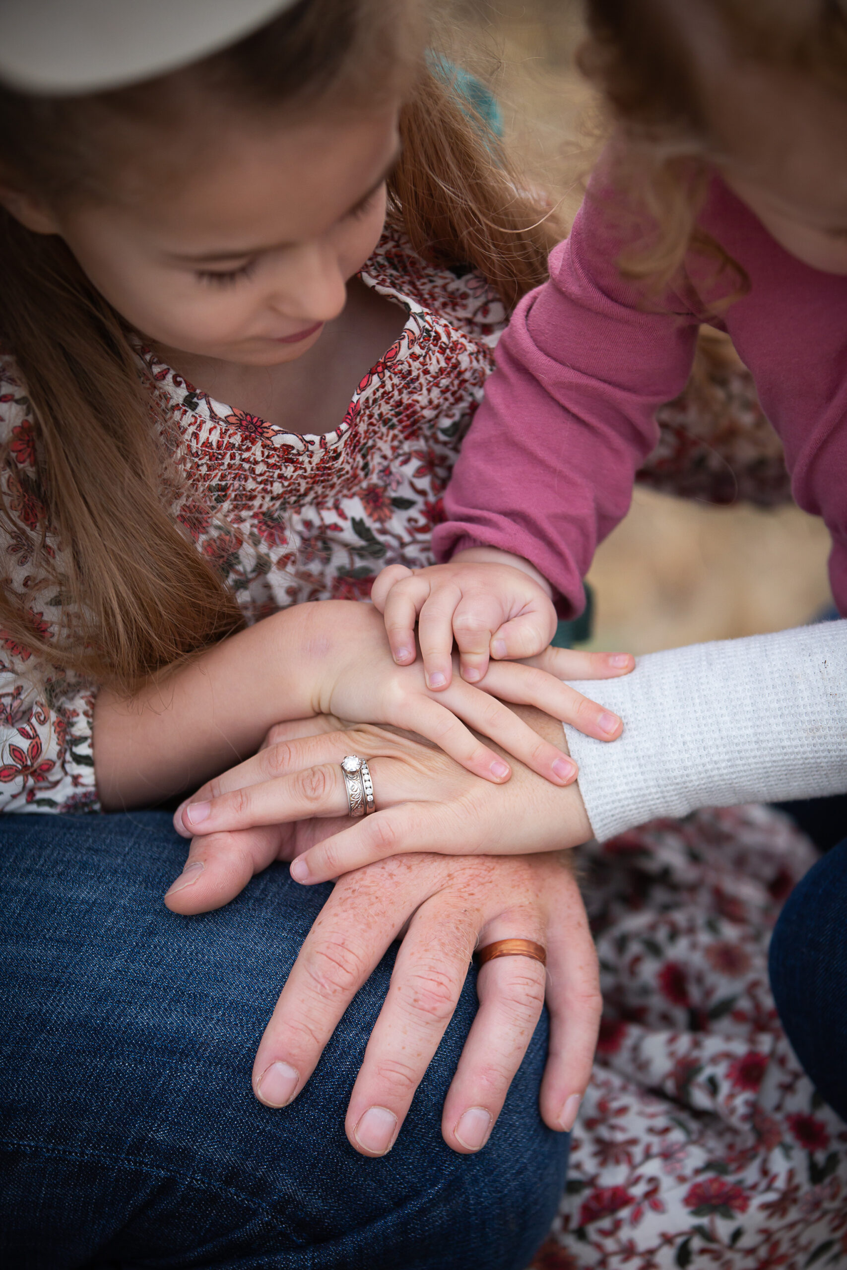 family members hands stacked