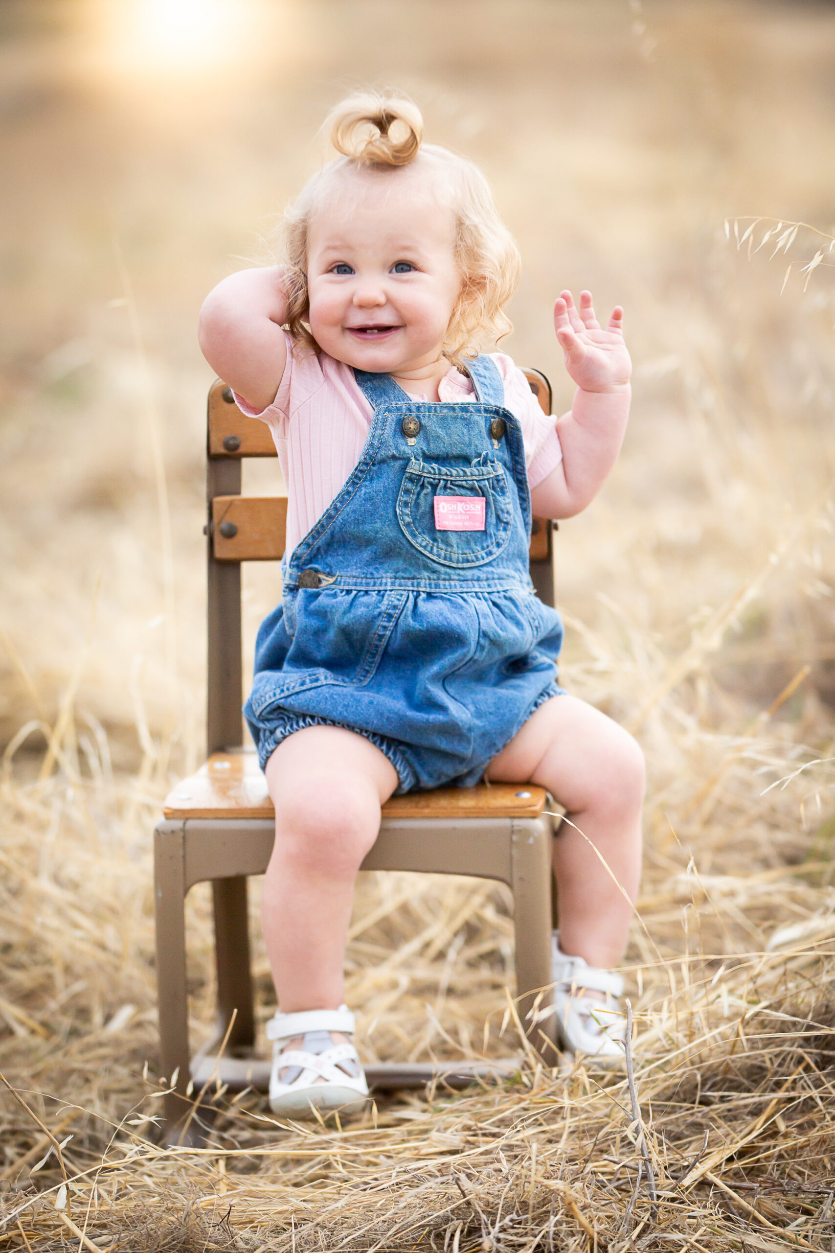 girl sitting in toddler chair