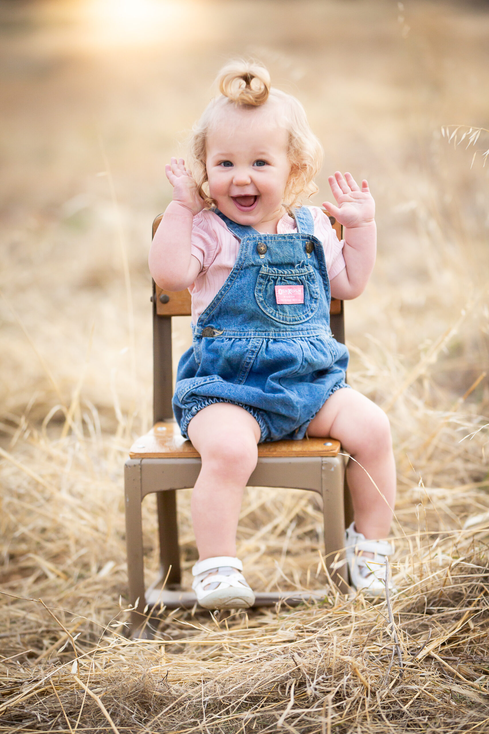 girl in osh kosh gosh overalls