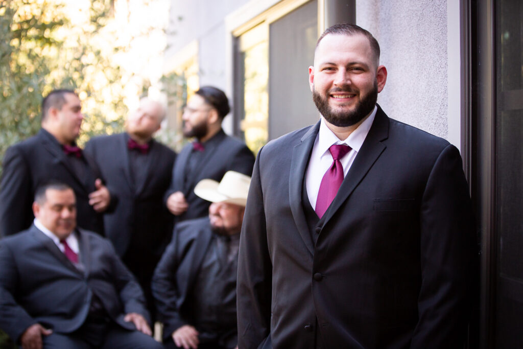 groom with groomsmen on wedding day
