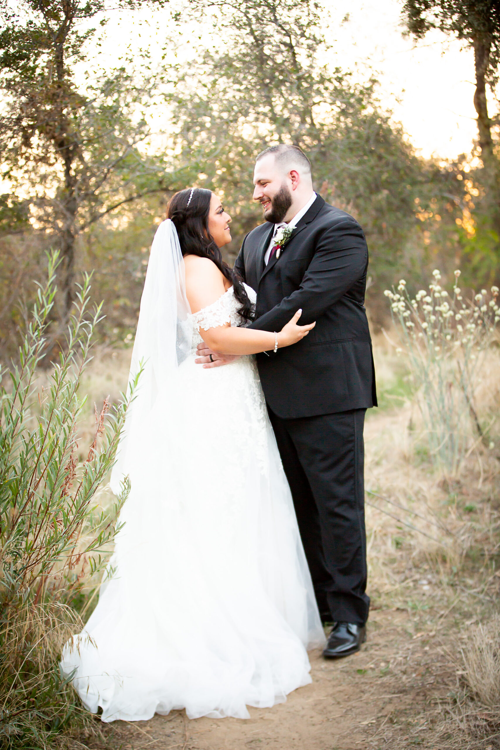 bride and groom looking at each other