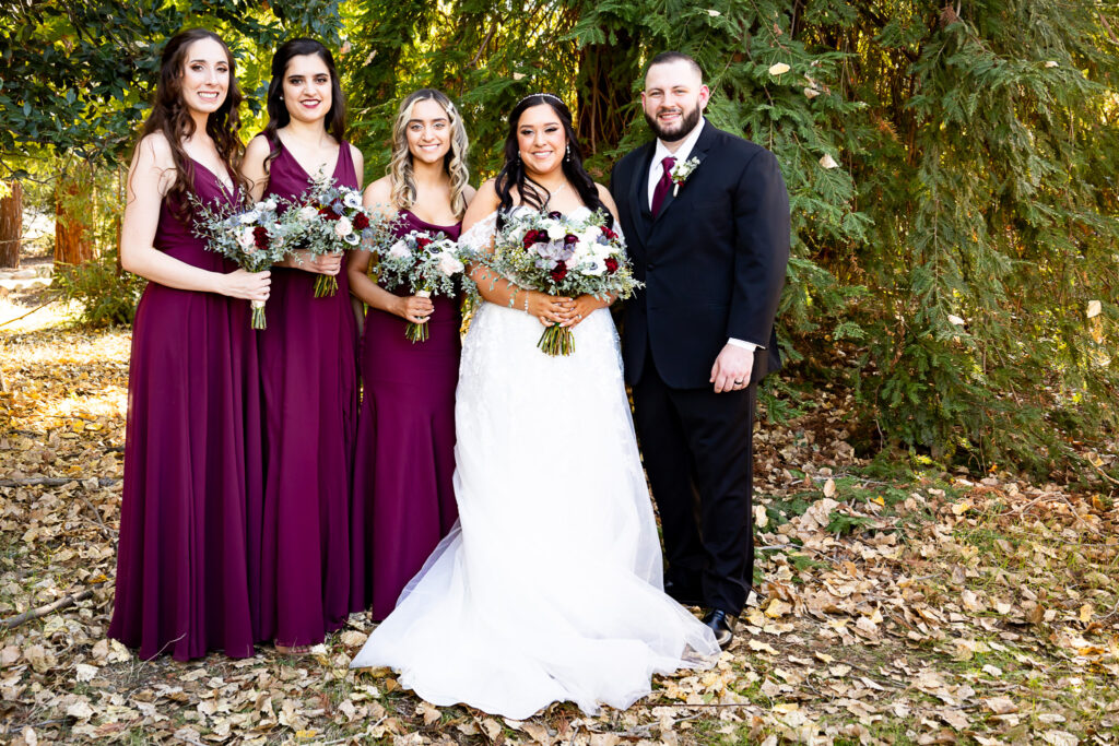 bride and groom with bridesmaids