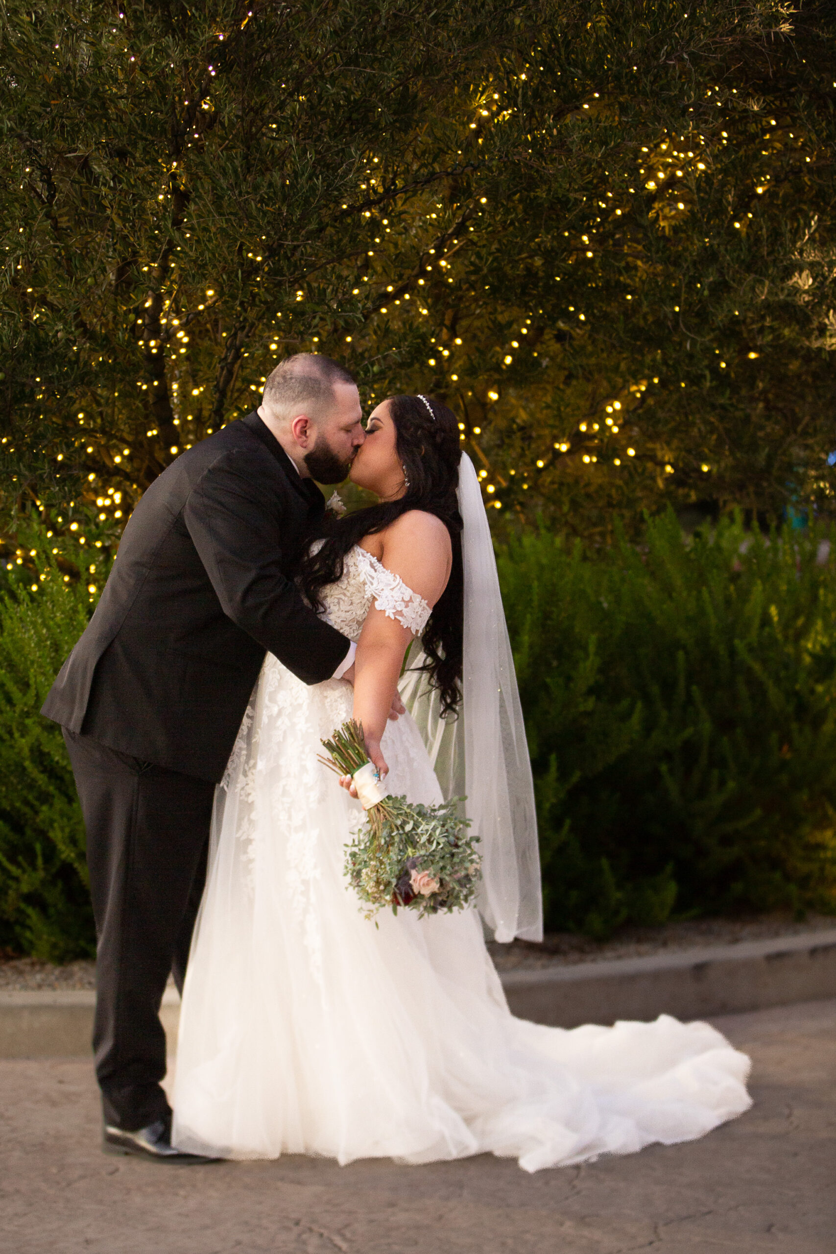 bride and groom kissing