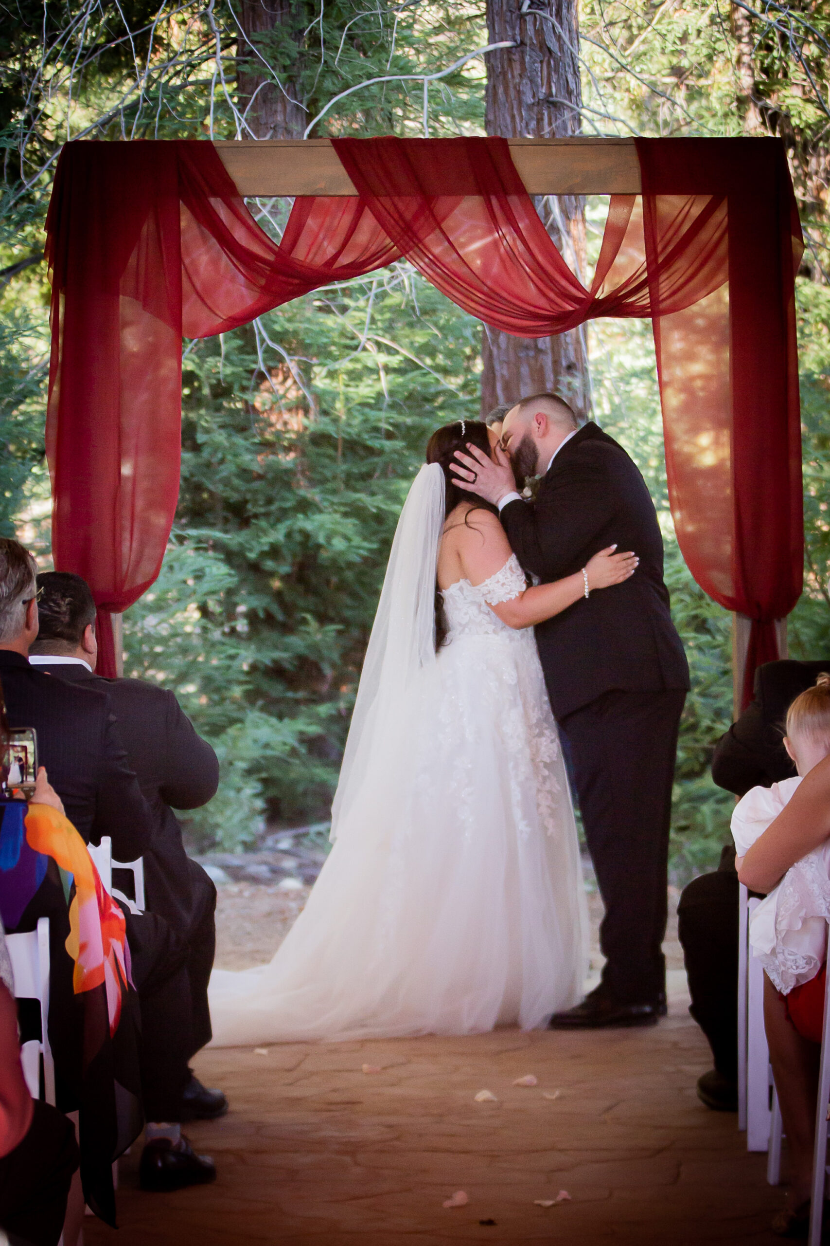bride and groom first kiss