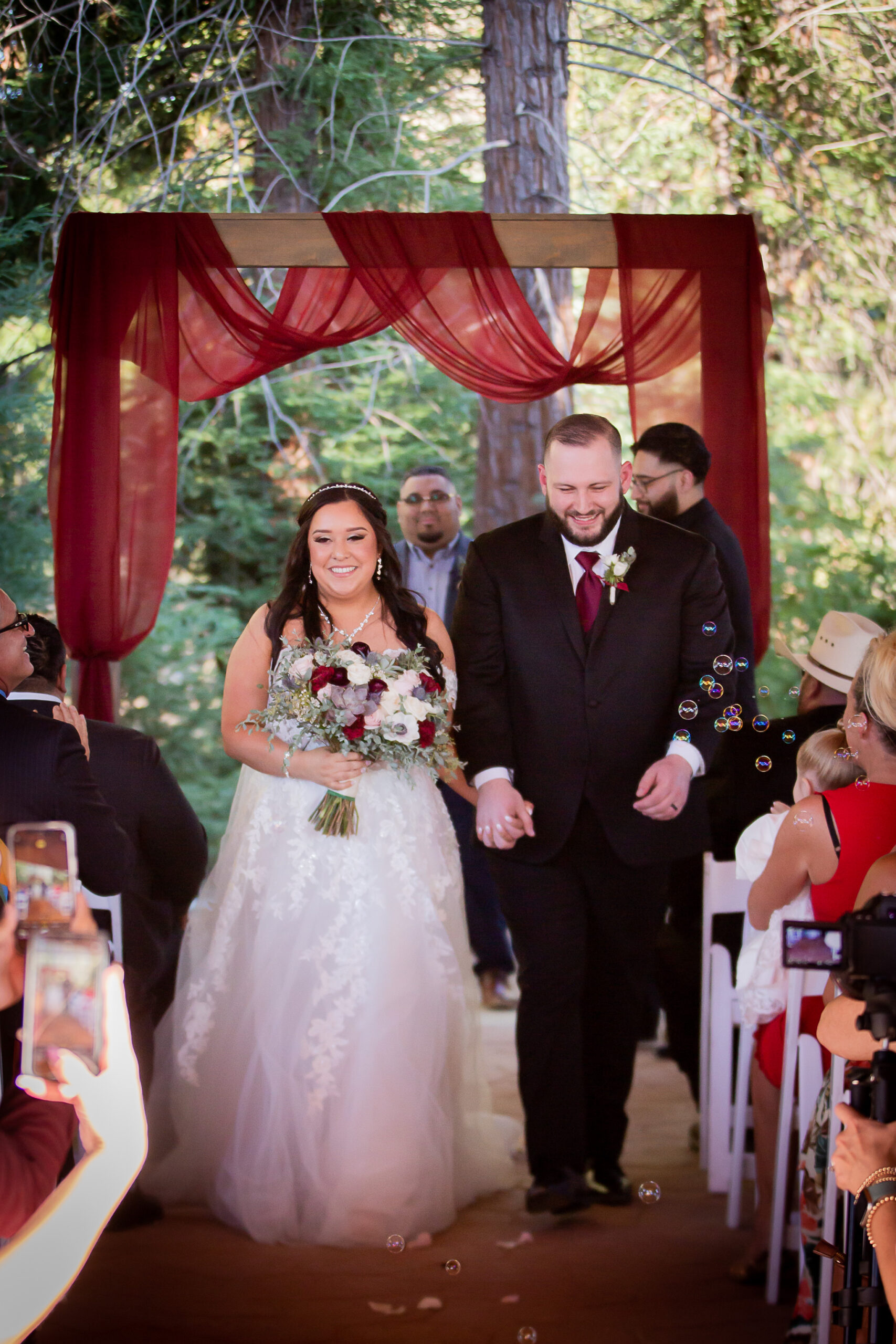 bride and groom leaving wedding ceremony