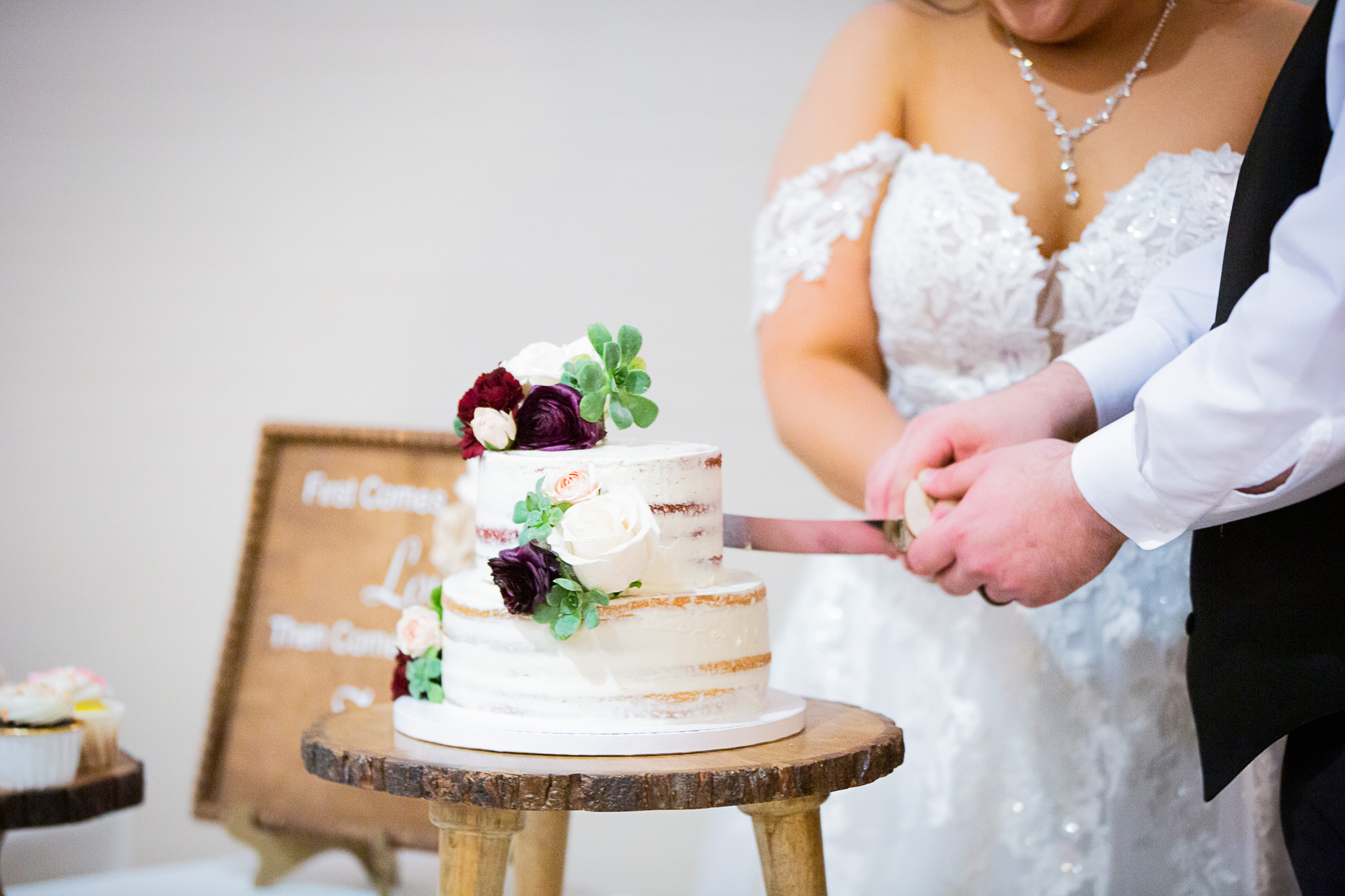 wedding cake being cut