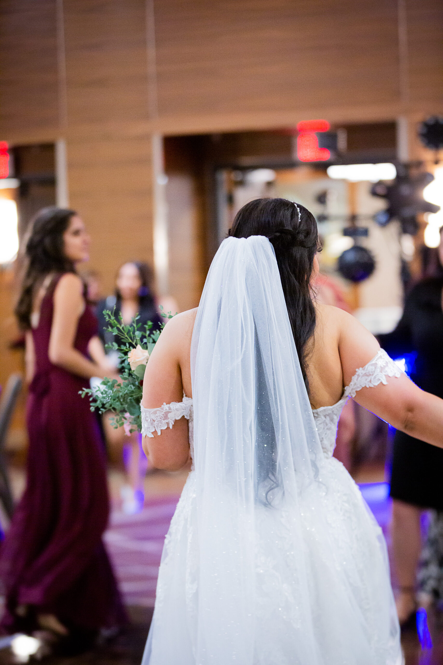 bride throwing bouquet