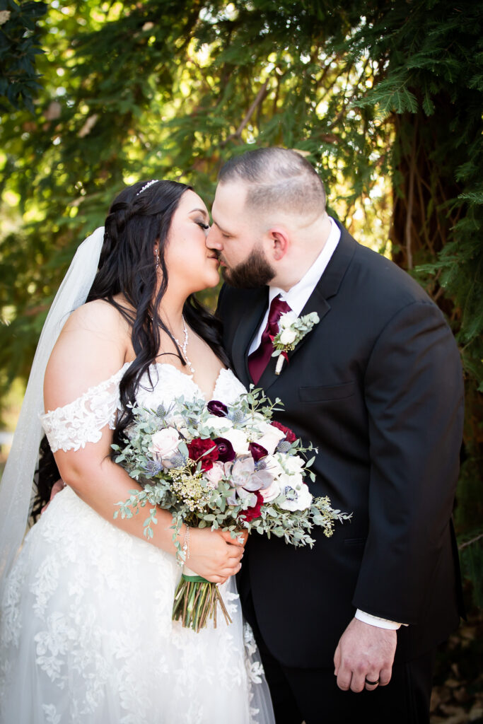 bride and groom kissing