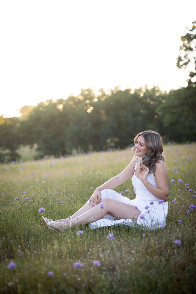 girl sitting in field red bluff ca