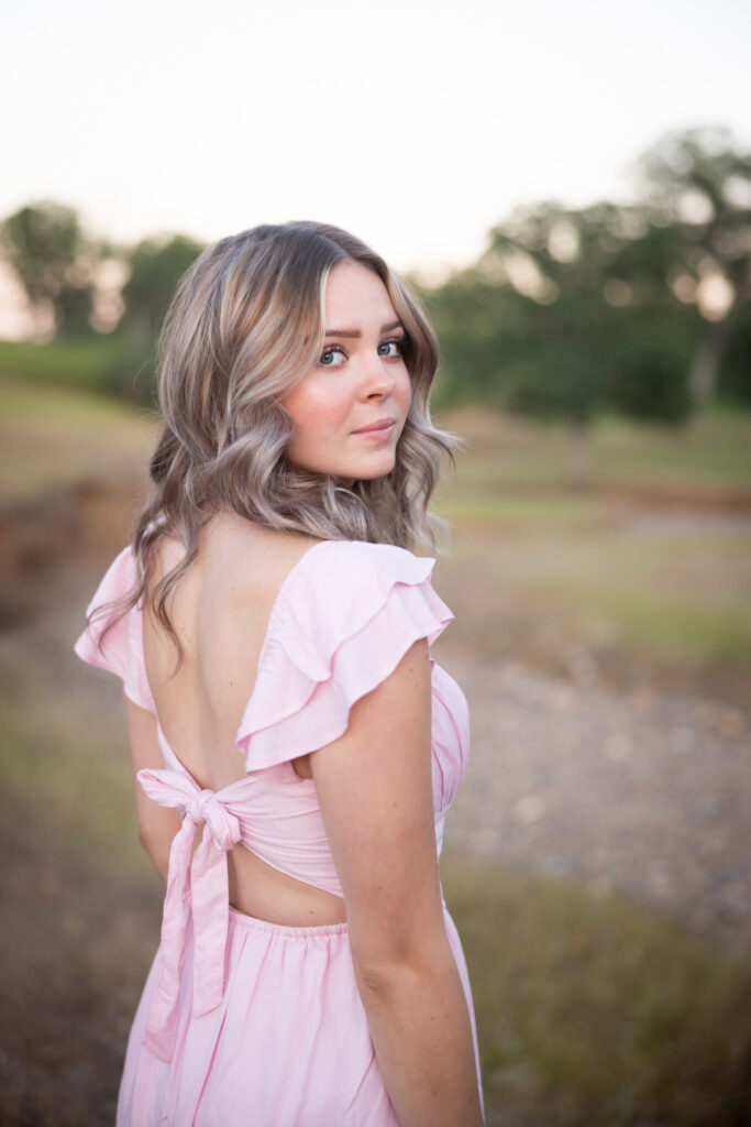 girl looking over shoulder from red bluff ca high school senior
